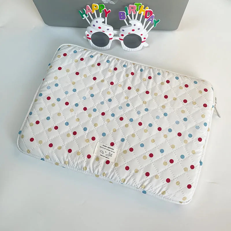 Women's polka dot laptop bag in breathable polyester with size options for computer protection