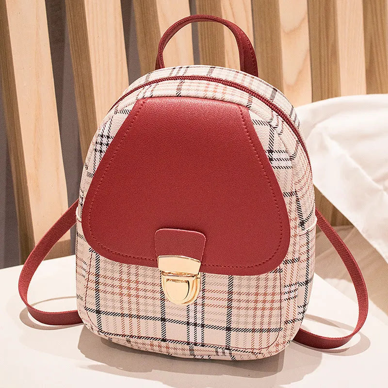 Diagonal one shoulder phone bag in PU leather, shown in a selection of colours.