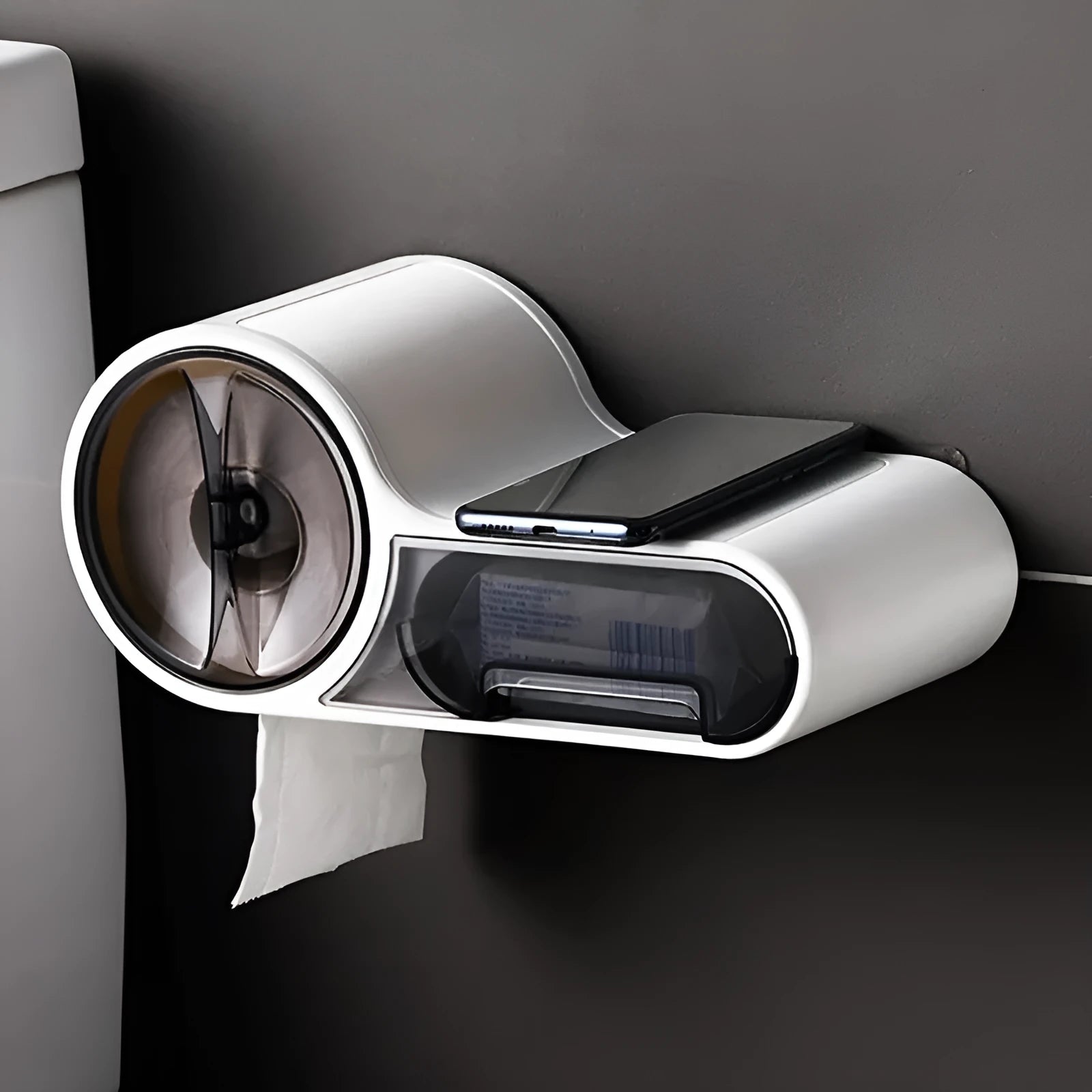 White plastic bathroom roll holder with streamlined curve design mounted on wall