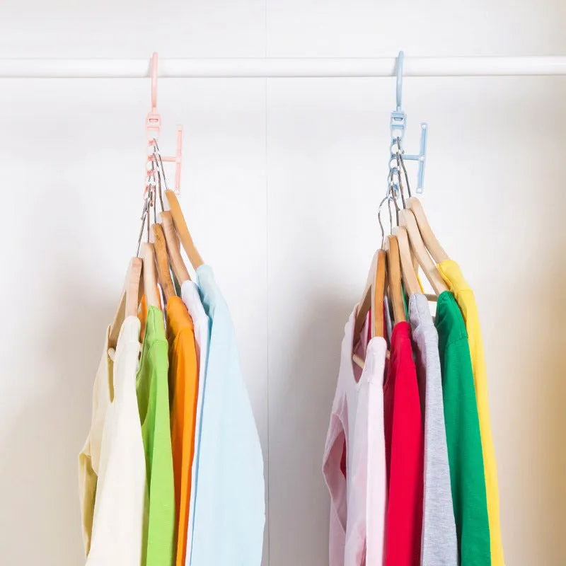 Blue revolving wardrobe hanger with five rotating branches and a central carry handle.