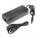 Black Xbox 360 E power adapter with direct plug design for 220V outlets