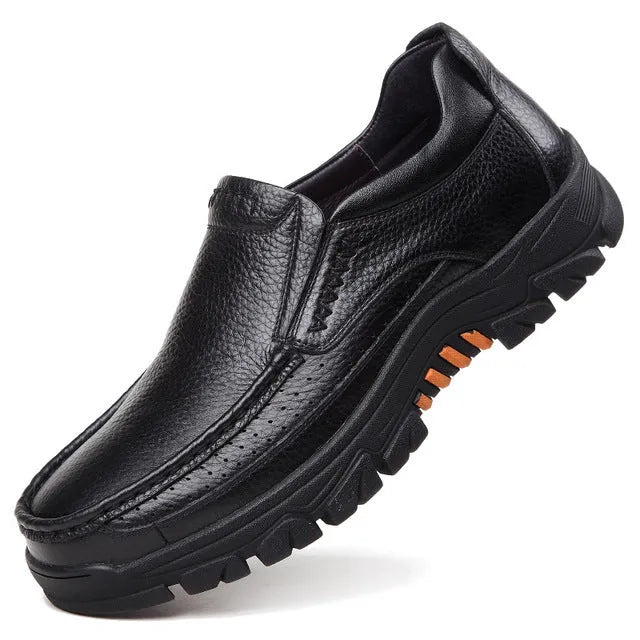 Black and brown business casual slip-on leather shoes with a rubber sole.