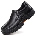 Black and brown business casual slip-on leather shoes with a rubber sole.
