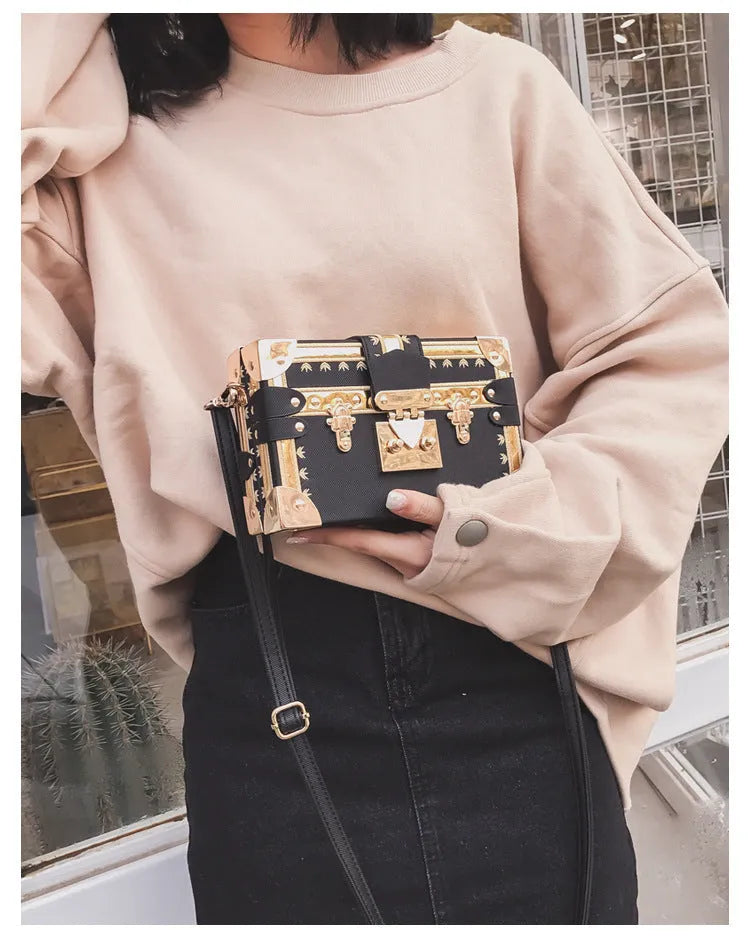Hard PU leather women's shoulder bag with flap design and crossbody strap in black or green