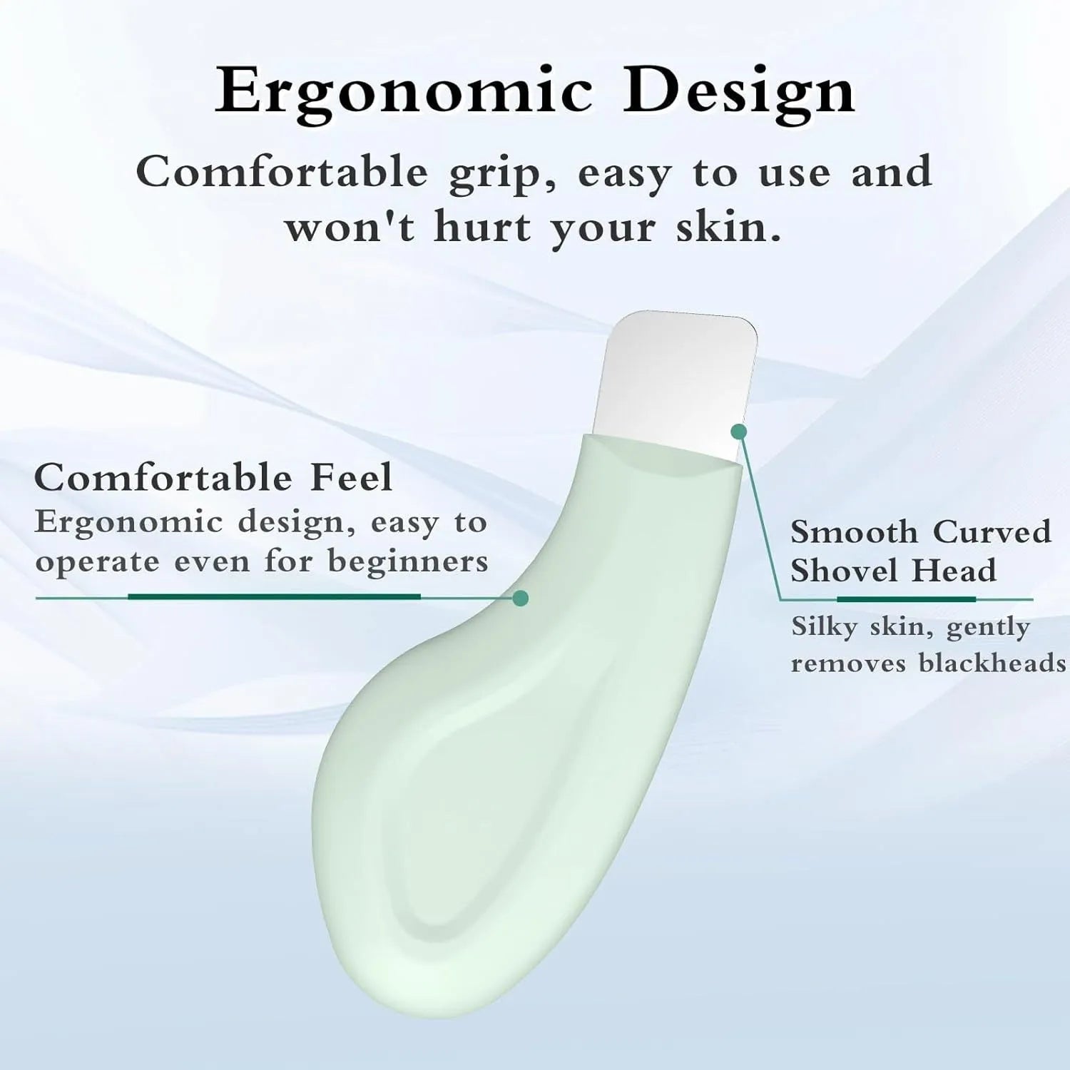 A stainless steel blackhead remover tool with a non-slip handle on a flat surface.