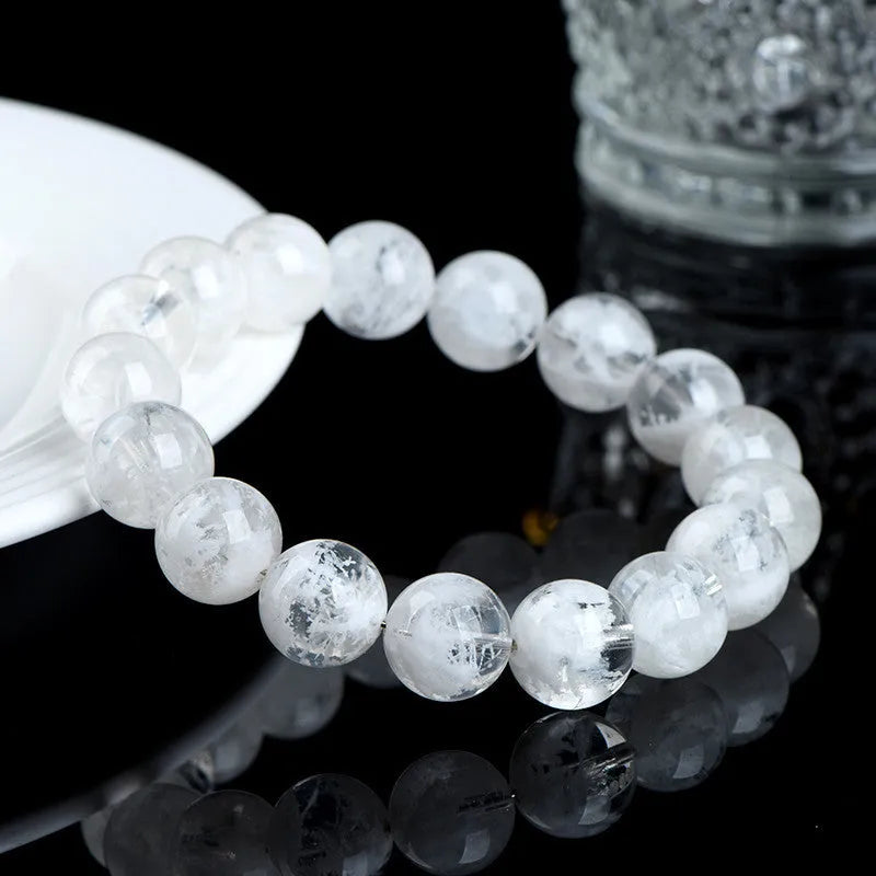 Natural blizzard snowflake crystal bracelet with round geometric beads and traditional Chinese elements