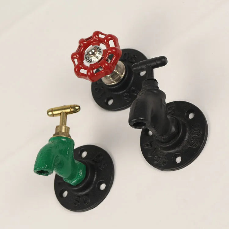 Water pipe style metal wall hanging hook in polished finish for towel organisation