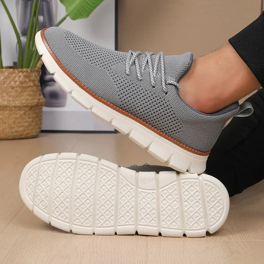 Men's grey and black casual sneakers with mesh fabric upper and round toe design