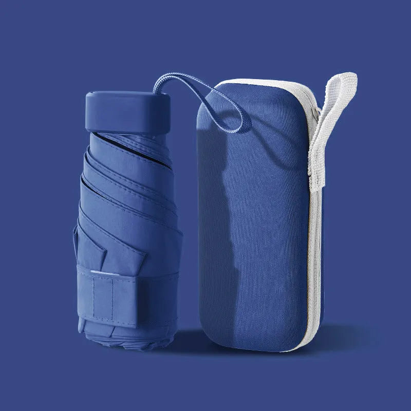 Ultra-light six-fold manual umbrella in sky blue with capsule box