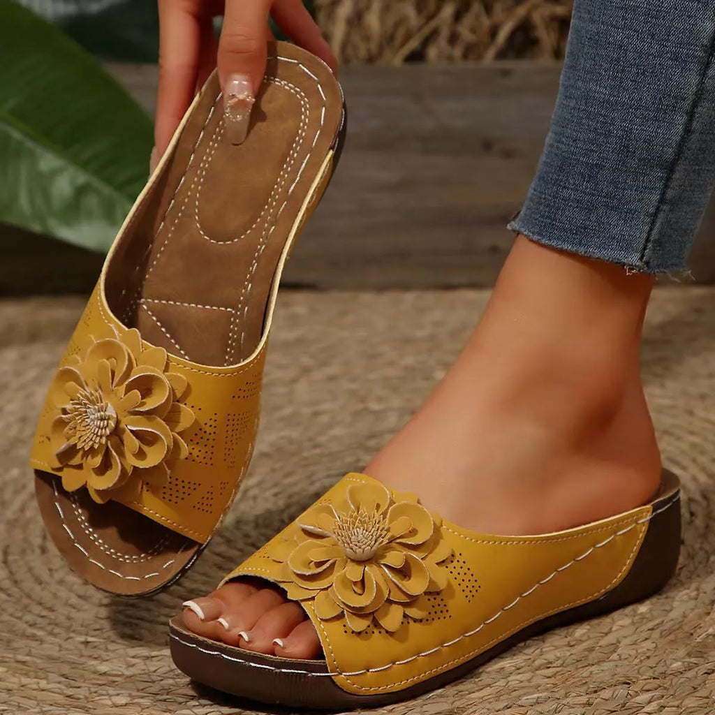 Women's dark brown fish mouth peep-toe slippers with a thick rubber sole and PVC upper.