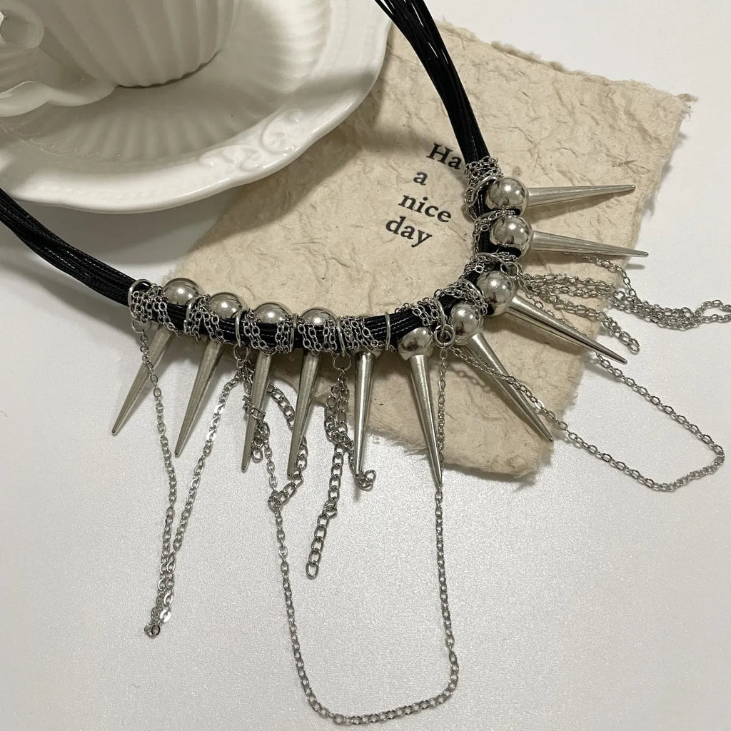 Women's casual leather necklace with round electroplated rivet beads and winding tassel detail
