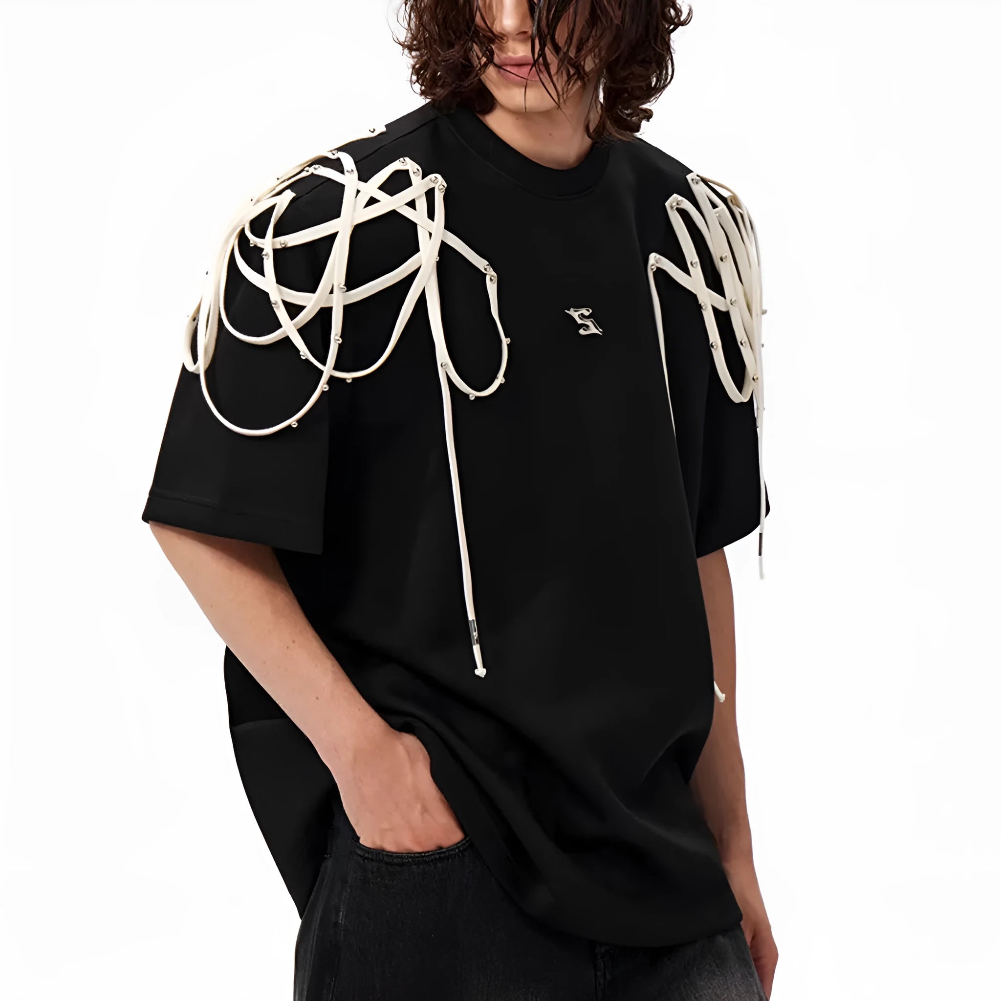 Black loose fit short-sleeve T-shirt with padded shoulders and decorative rivet ribbon detail on a hanger.