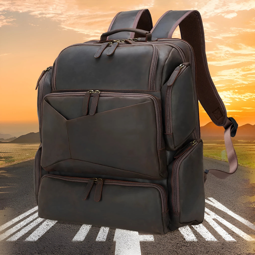 Dark brown Retro Crazy Horse leather backpack for a 17-inch laptop, showing internal organiser pockets.