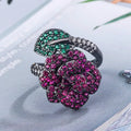 Gold-plated geometric flower ring with red stone for women, black gold colour