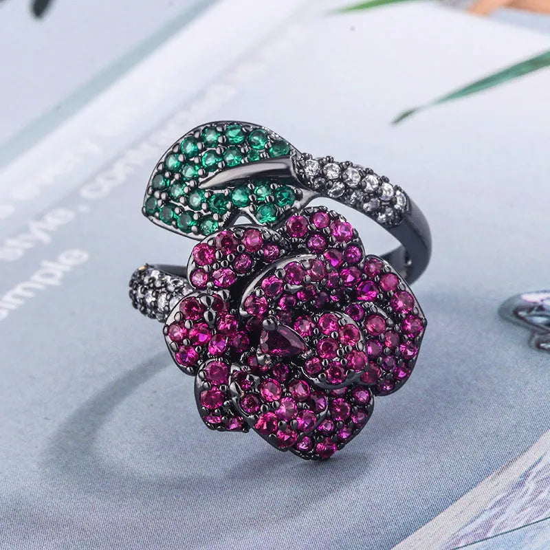 Gold-plated geometric flower ring with red stone for women, black gold colour
