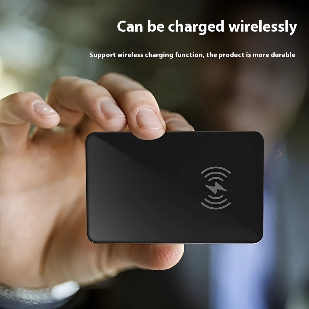 Black plastic pet tracker with wireless charging and NFC, card dimensions 85x54mm