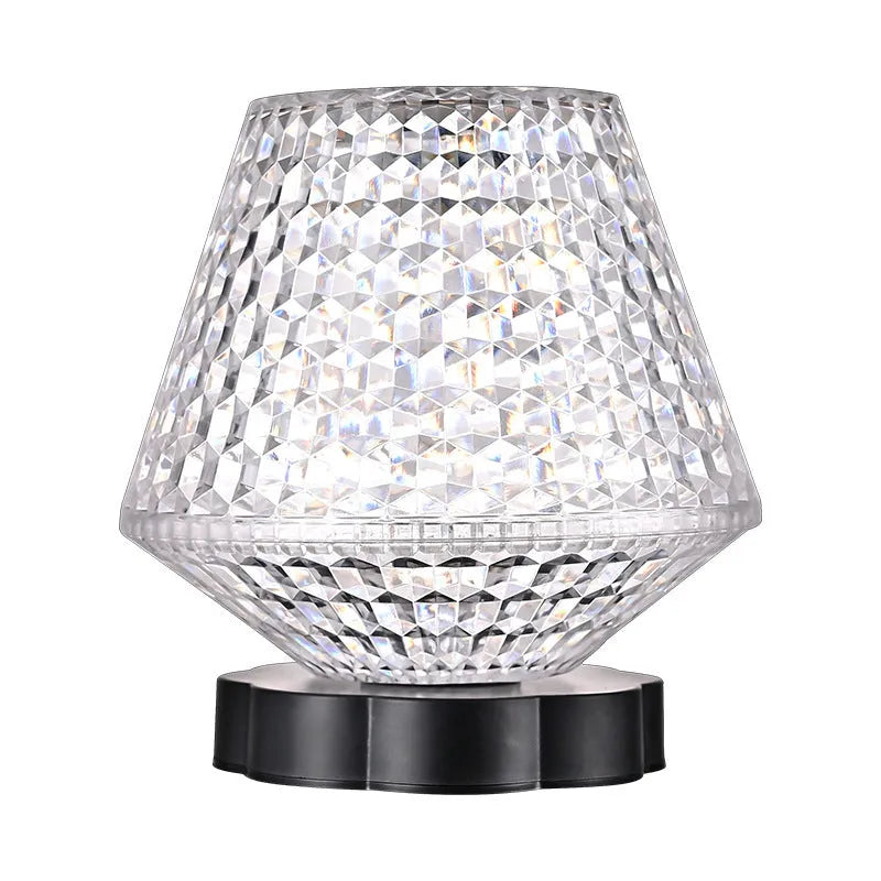 Crystal table lamp with touch base and LED lighting on wooden surface