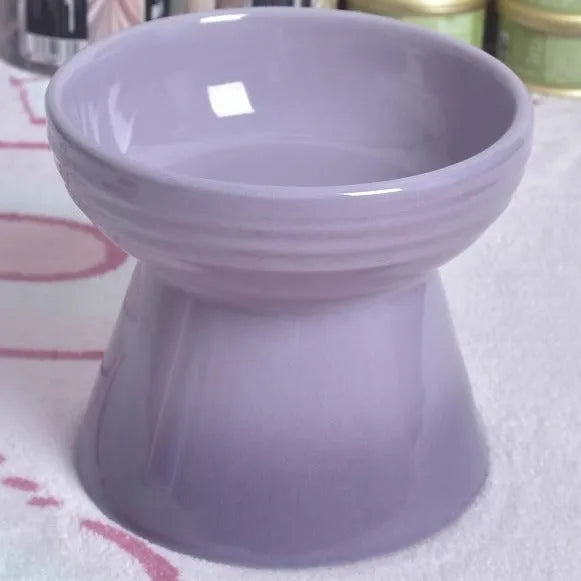 Black ceramic pet bowl with high foot and neck protector for dogs and cats.