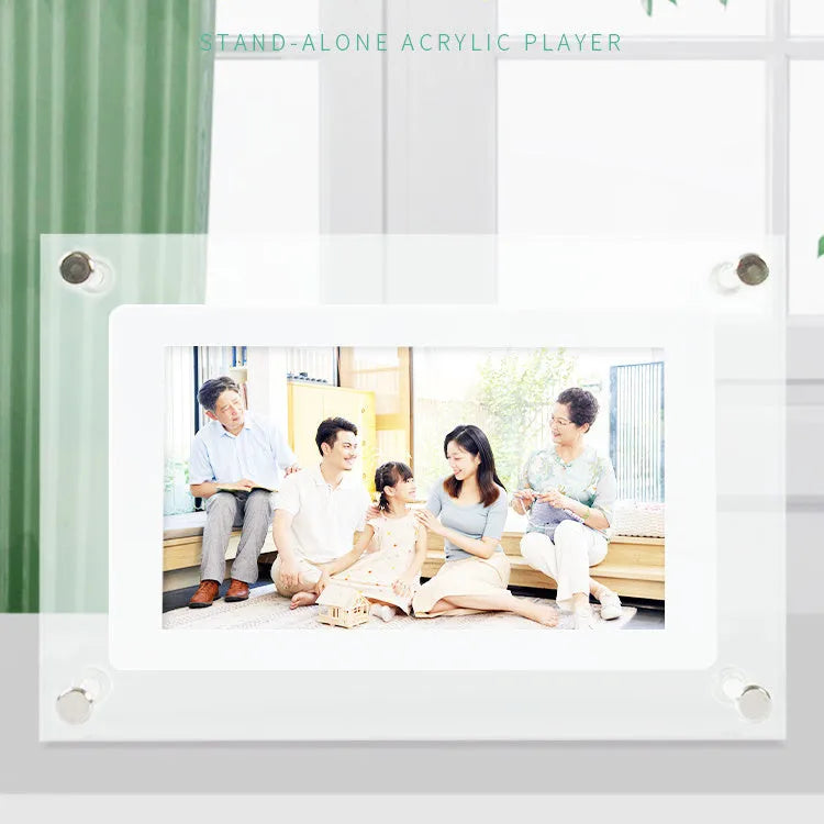 White acrylic digital picture frame showing family photos on a 5-inch vertical screen