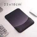 Square silica gel wrist rest mouse pad with cloth top in a choice of colours on a desk.