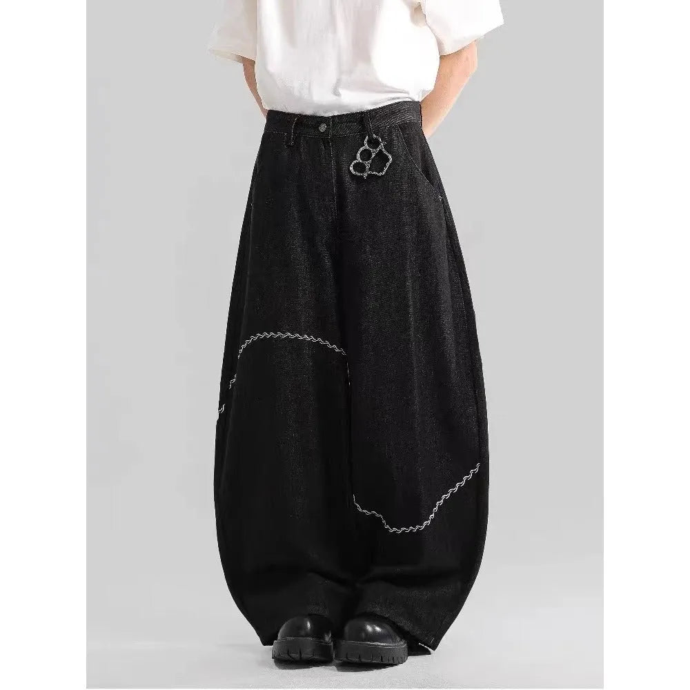 Black straight-leg denim trousers with mid-waist design and zip placket closure