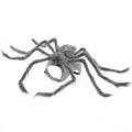 A grey and black spider costume for a small dog, shown from the side.