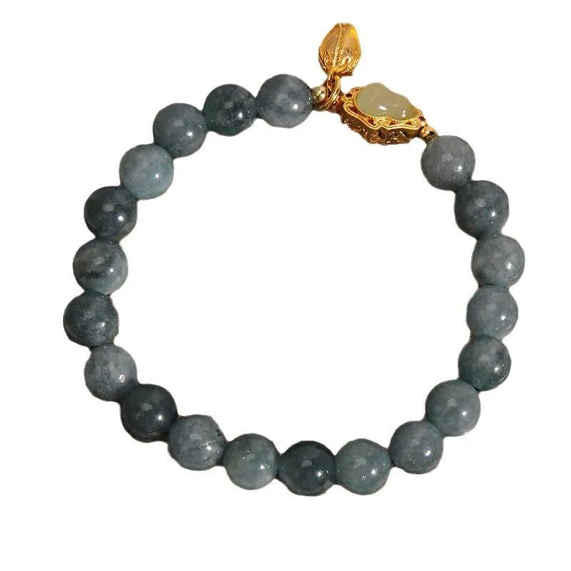 Women's natural stone bracelet with lotus flower gourd pendant in sky blue colour