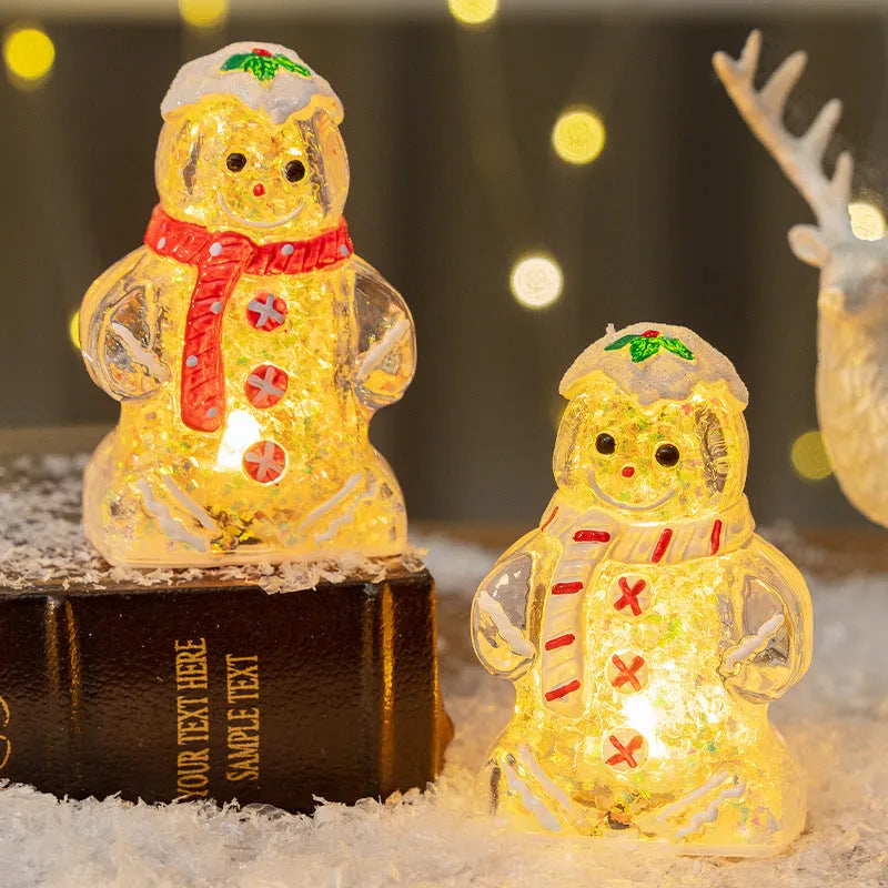 Glowing plastic gingerbread snowman Christmas ornament with a red scarf