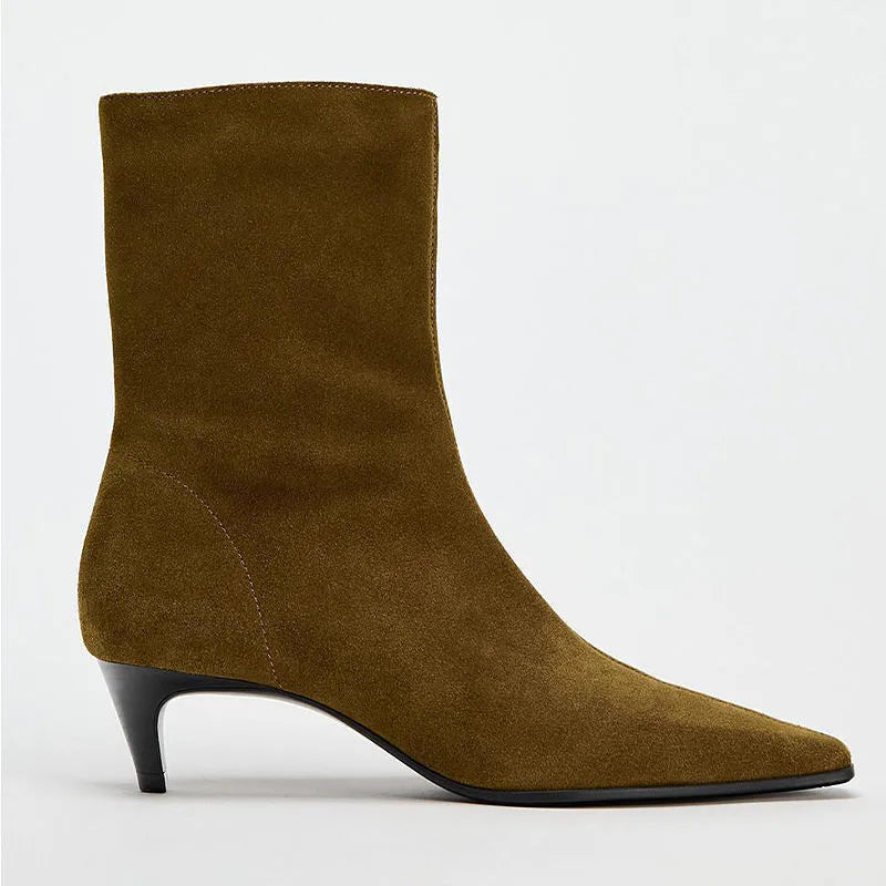 Brown square toe ankle boots with a side zip and a mid kitten heel on a plain background.