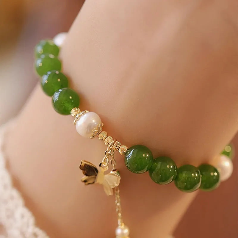 Natural green chalcedony bracelet with round beads and minority design elements for women