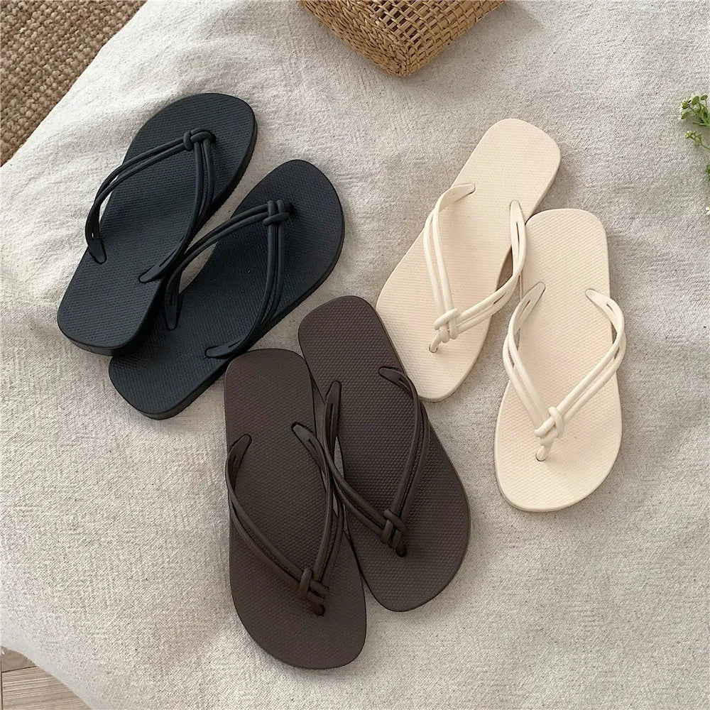 Men's PVC flip flops in beige with a non-slip sole and toe-covering style.