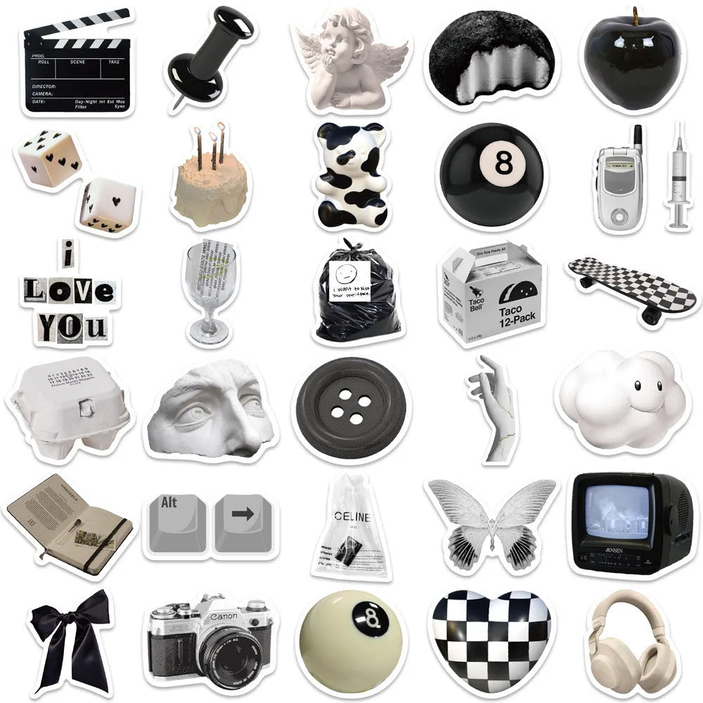 Assortment of black and white vinyl stickers featuring coffee cups and abstract designs for laptops and phones.