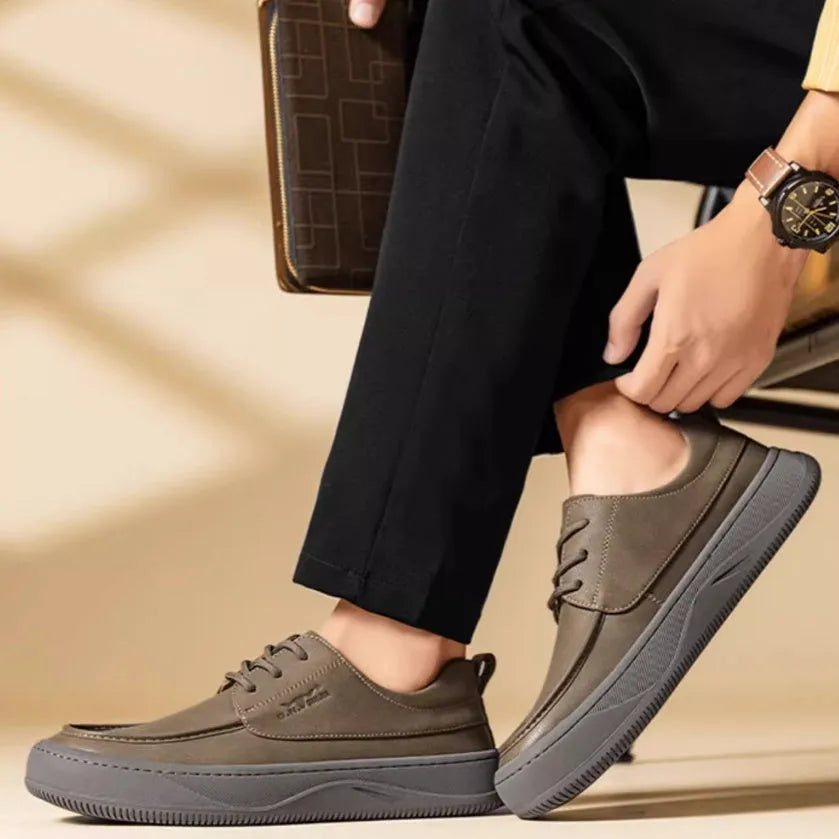 Brown retro-style casual leather shoes with big toe design on a neutral background