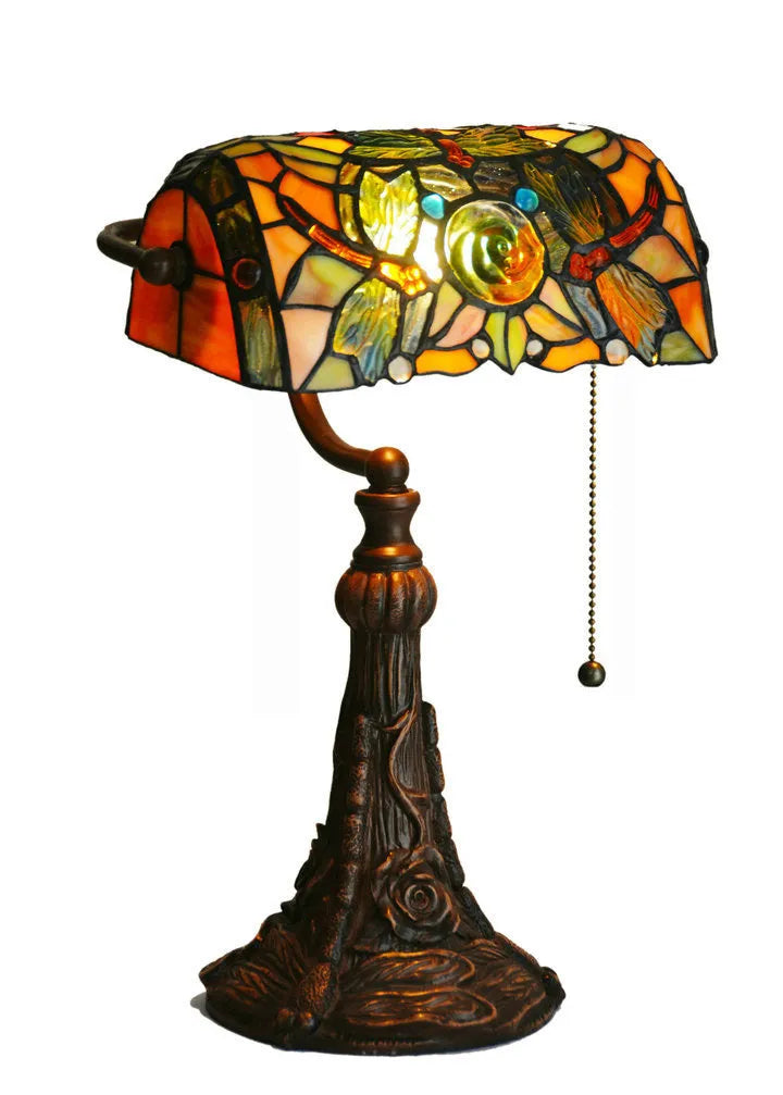 10-inch Tiffany stained glass table lamp with multicoloured glass and resin base on desk