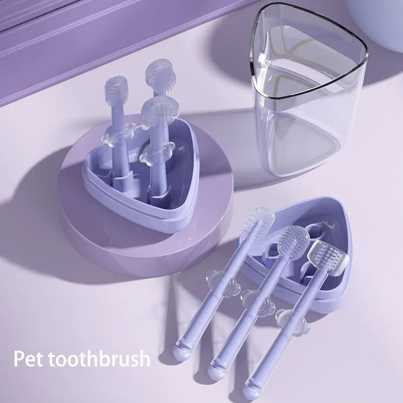Soft silicone pet toothbrush for dogs and cats in blue, green, and purple colour options