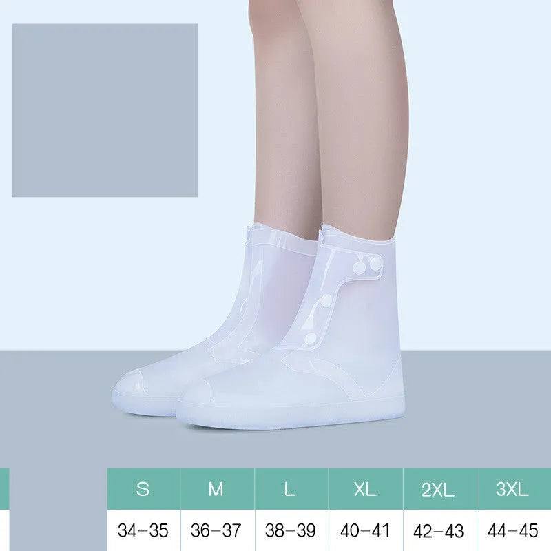 White PVC high-top reusable waterproof shoe cover for women, shown on a foot.