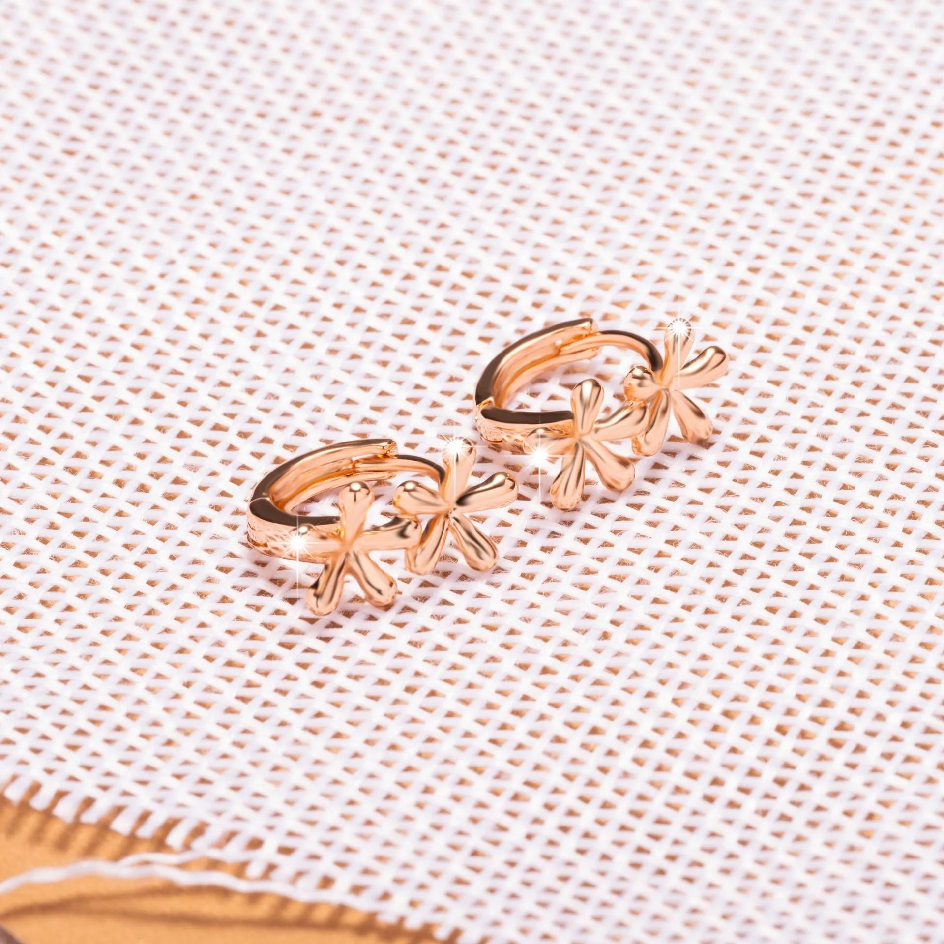 Rose gold electroplated waterdrop flower earrings with circular design for women