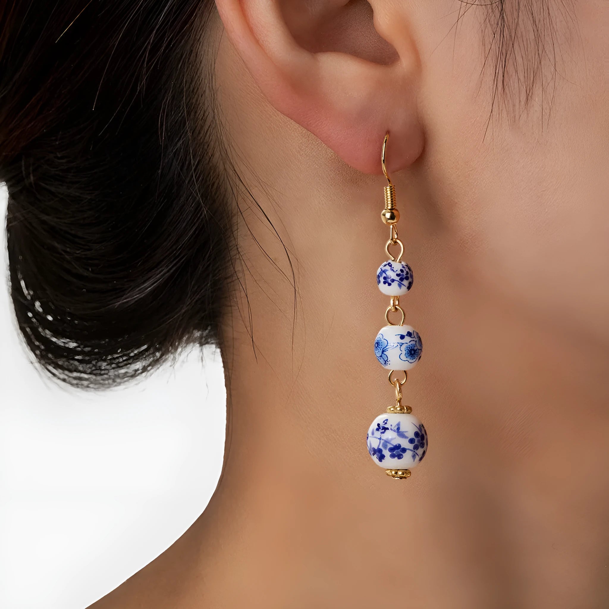 Blue and white porcelain ceramic bead earrings with geometric alloy elements in Chinese style design