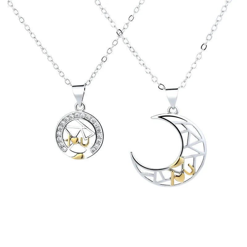 Copper sun and moon tooth couple necklace set with electroplated finish on a cross chain.