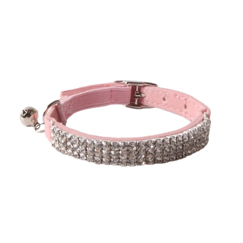 Soft flannel elastic cat collar with a quick-release buckle in pink, shown on a white background.