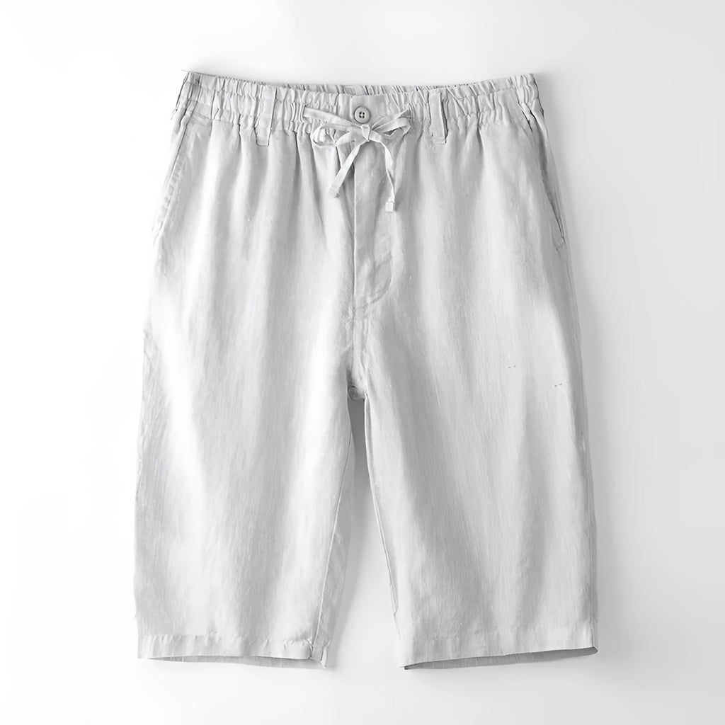 Men's loose-fit linen capri pants in a straight-leg style on a neutral background.