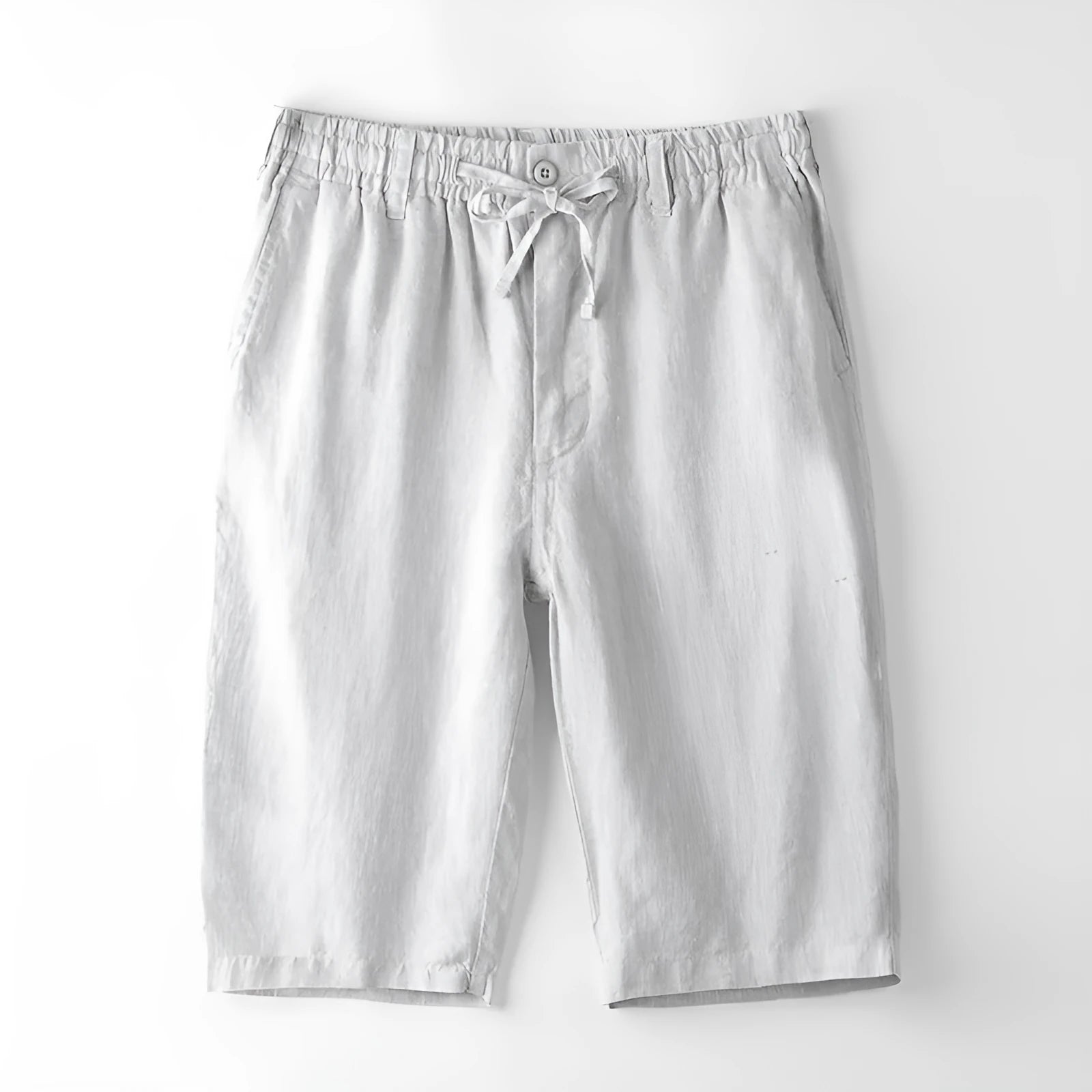 Men's loose-fit linen capri pants in a straight-leg style on a neutral background.