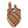 Autumn plaid dog bandana with tassel edges in seasonal colours
