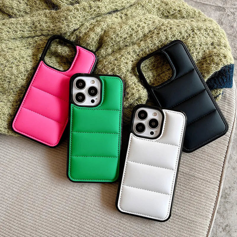 Candy Down Jacket Shape Phone Case for iPhone in black, white, rose red, or green showing puffer texture and dual-material build.