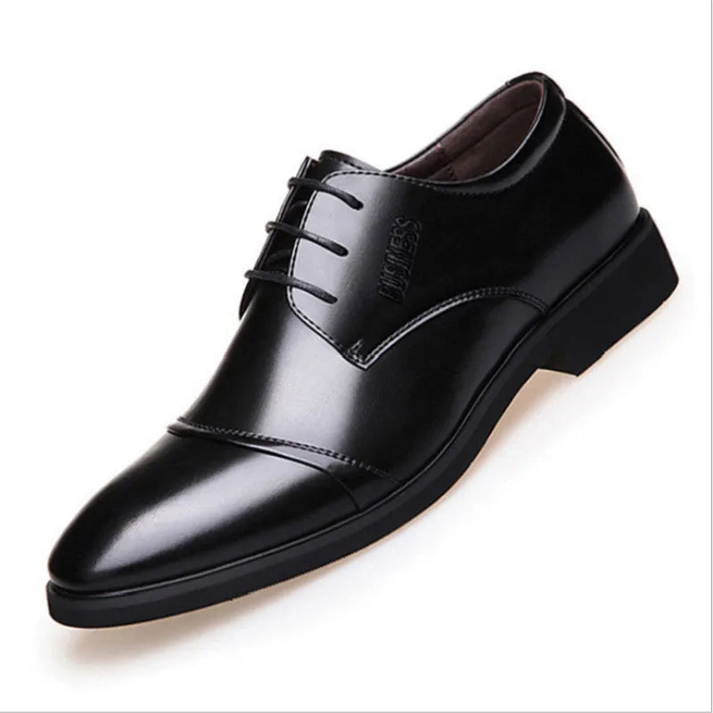 Men's black formal lace-up shoes with stitching detail on a rubber sole