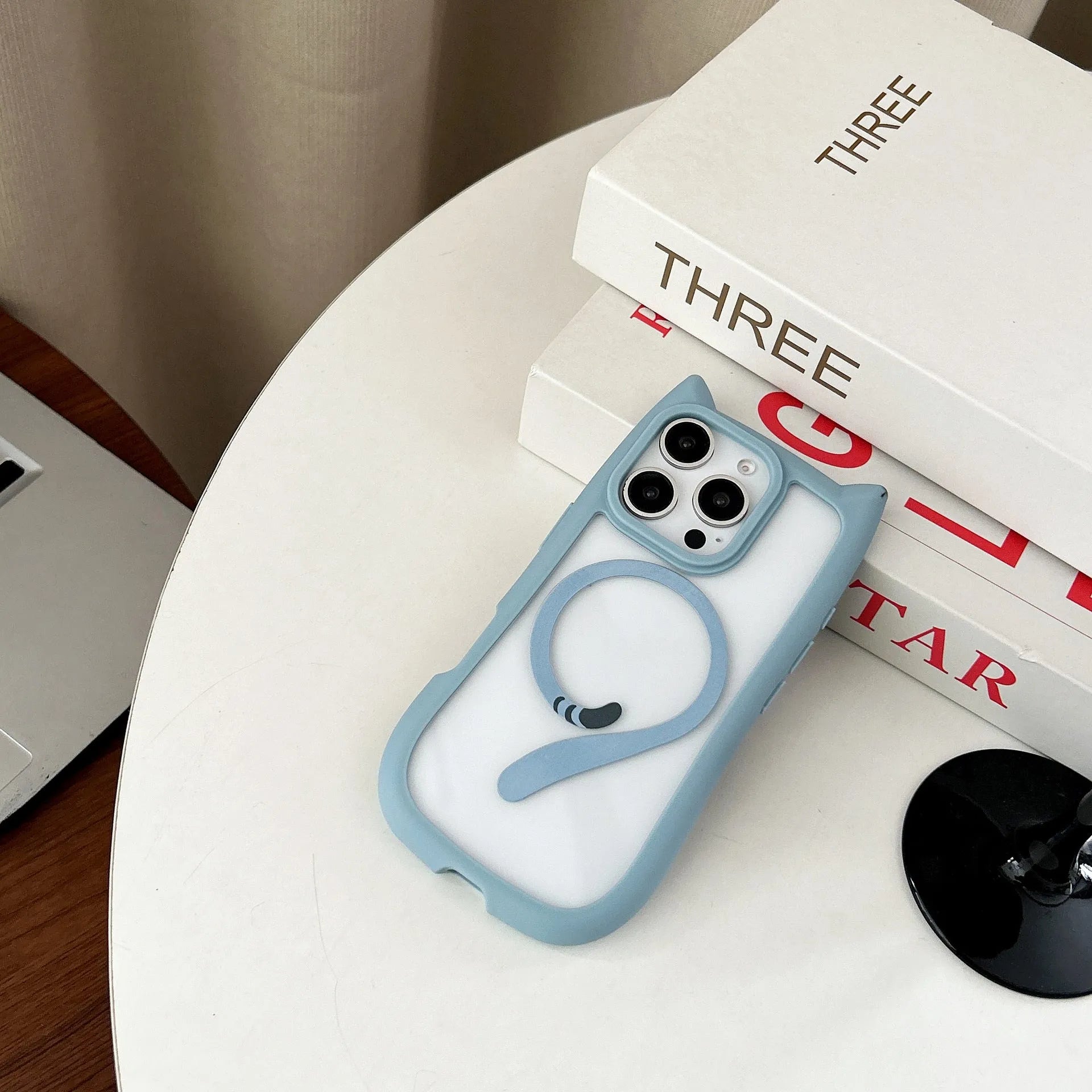 Transparent acrylic and TPU iPhone 17 phone case with magnetic suction in black, blue, grey, and pink colour options.