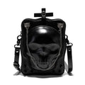 Black mini square messenger bag with a gothic embossed skull design, chain detail, and a crossbody strap.