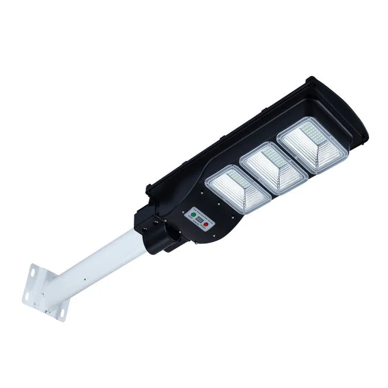 Integrated solar street light with solar panel on top and LED light unit below, for outdoor installation.