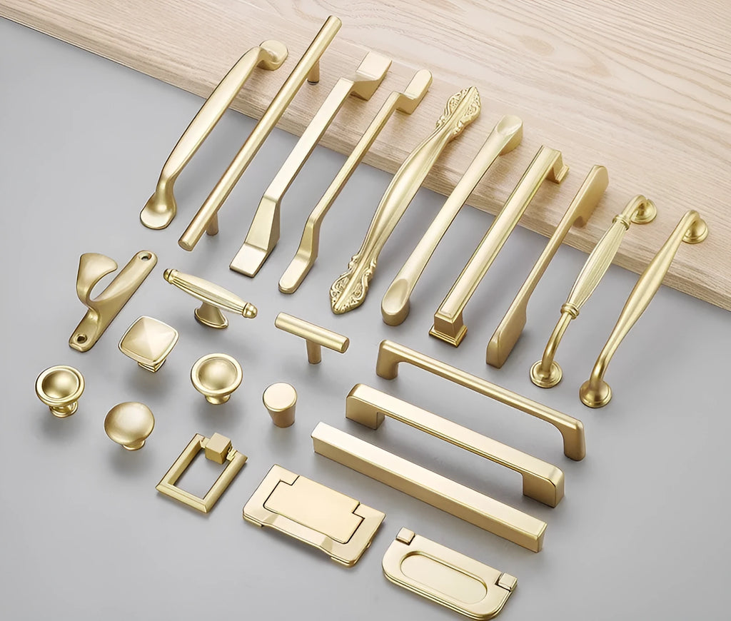Gold T-shaped aluminium alloy cabinet door handle for single-hole mounting.