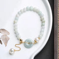 Women's jade pearl bracelet with geometric design and peace buckle closure in Chinese national style